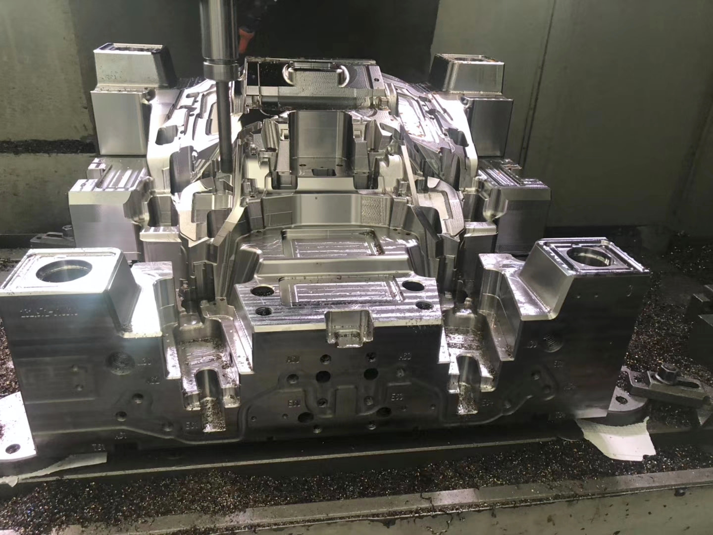 Mold cavity at a CNC station