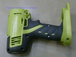 Double injection mold for power tool parts